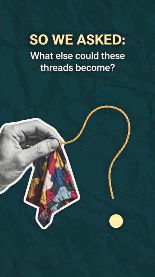 Paper cut-out hand holding fabric beside a thread question mark